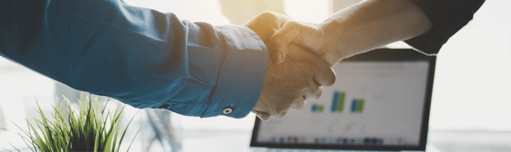 man and woman shaking hands